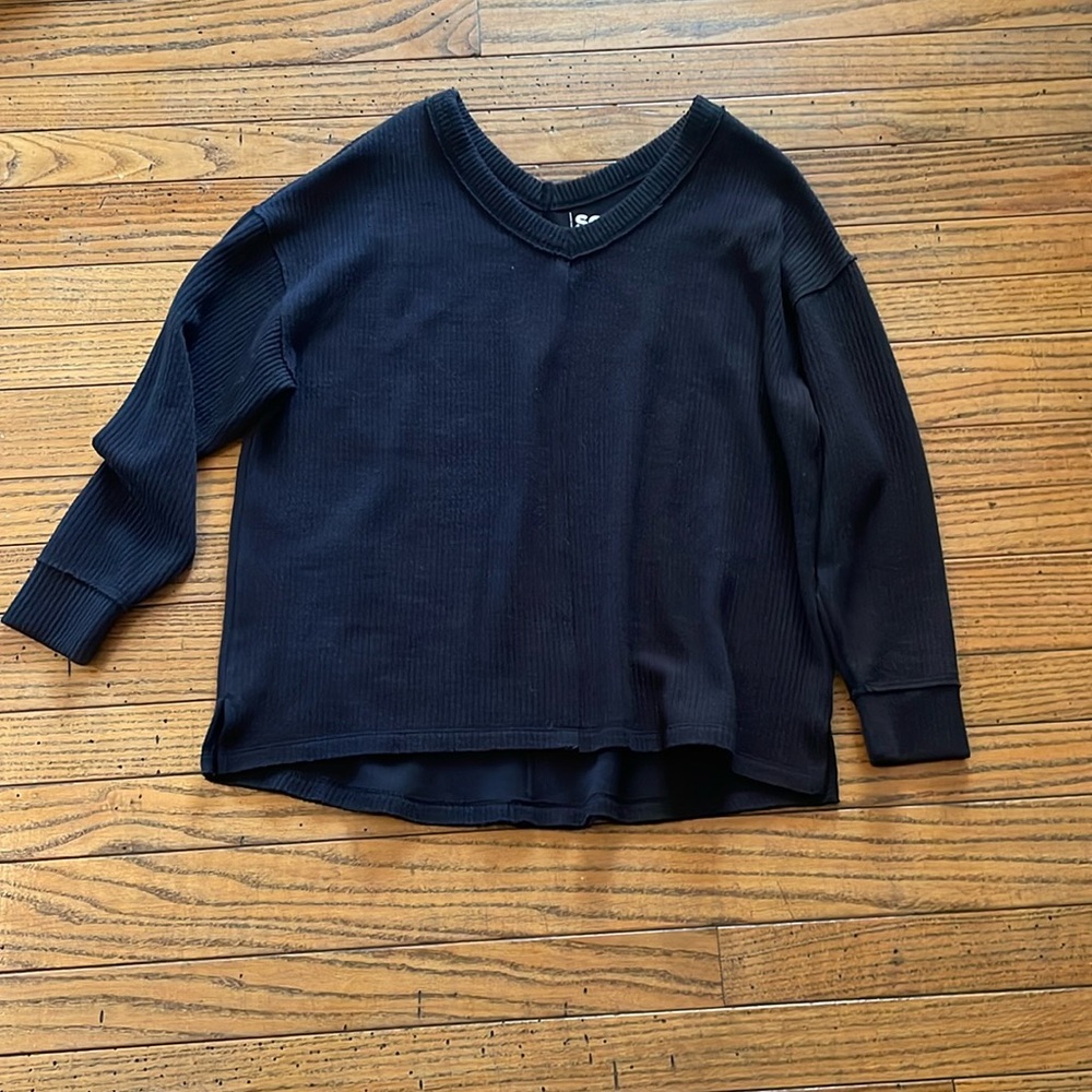 Black v neck sweater. Brand is SO. Size M.